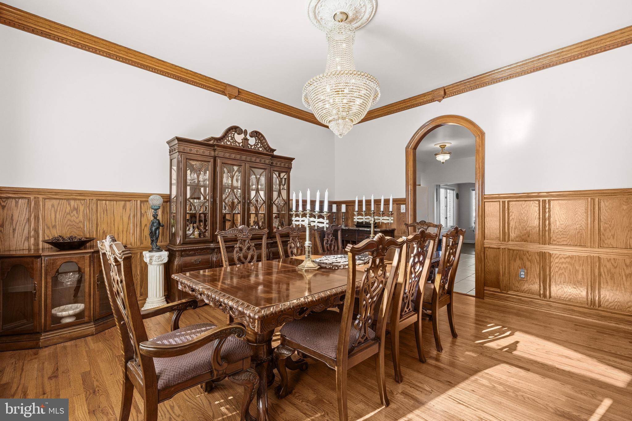 16170 Ed Warfield Road Woodbine, MD 21797 - Photo 24 of 80 a view of a dining room with furniture and wooden floor