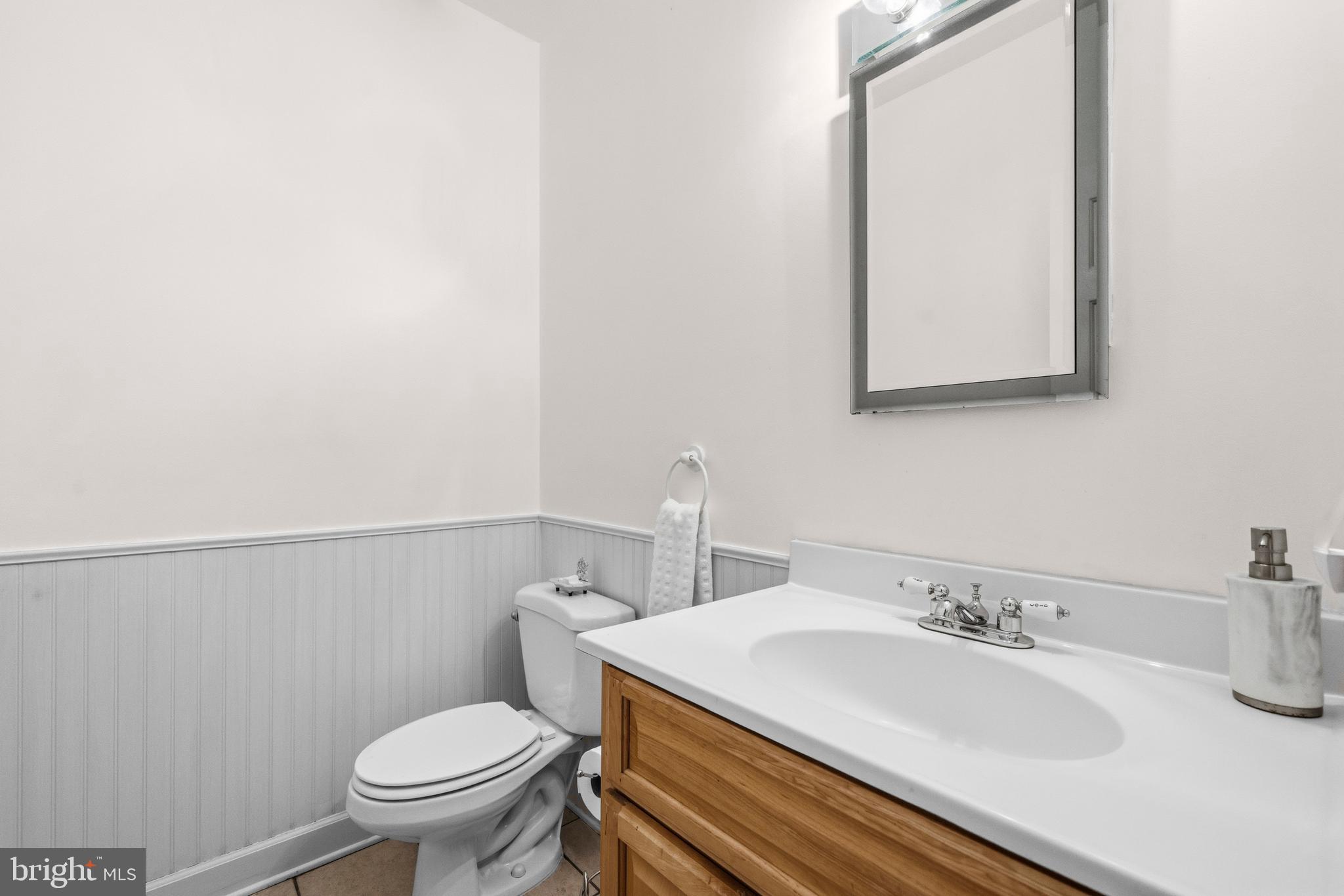 16170 Ed Warfield Road Woodbine, MD 21797 - Photo 26 of 80 a bathroom with a sink and a toilet