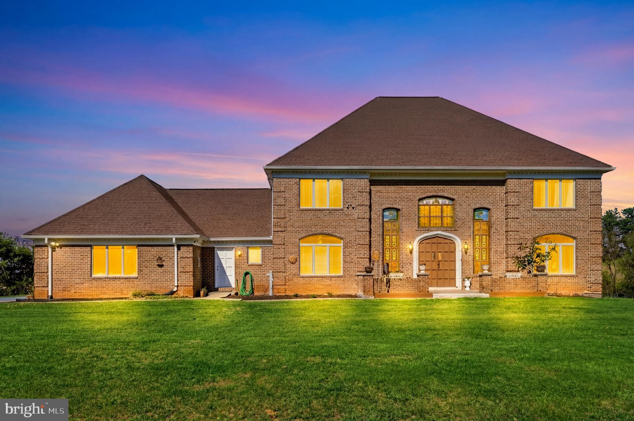 16170 Ed Warfield Road Woodbine, MD 21797 - Photo 4 of 80 a front view of a house with garden