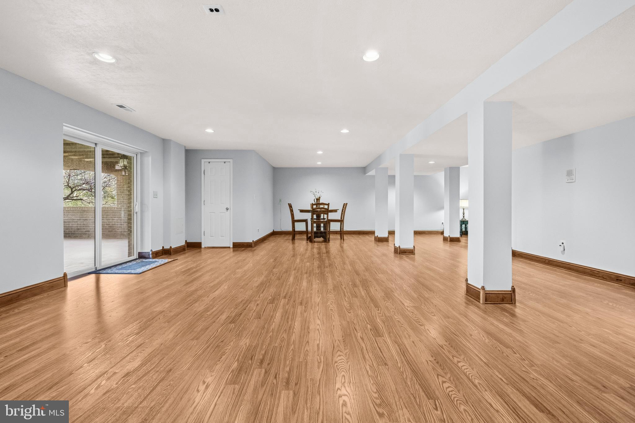 16170 Ed Warfield Road Woodbine, MD 21797 - Photo 55 of 80 a view of a living room a wooden floor and a window