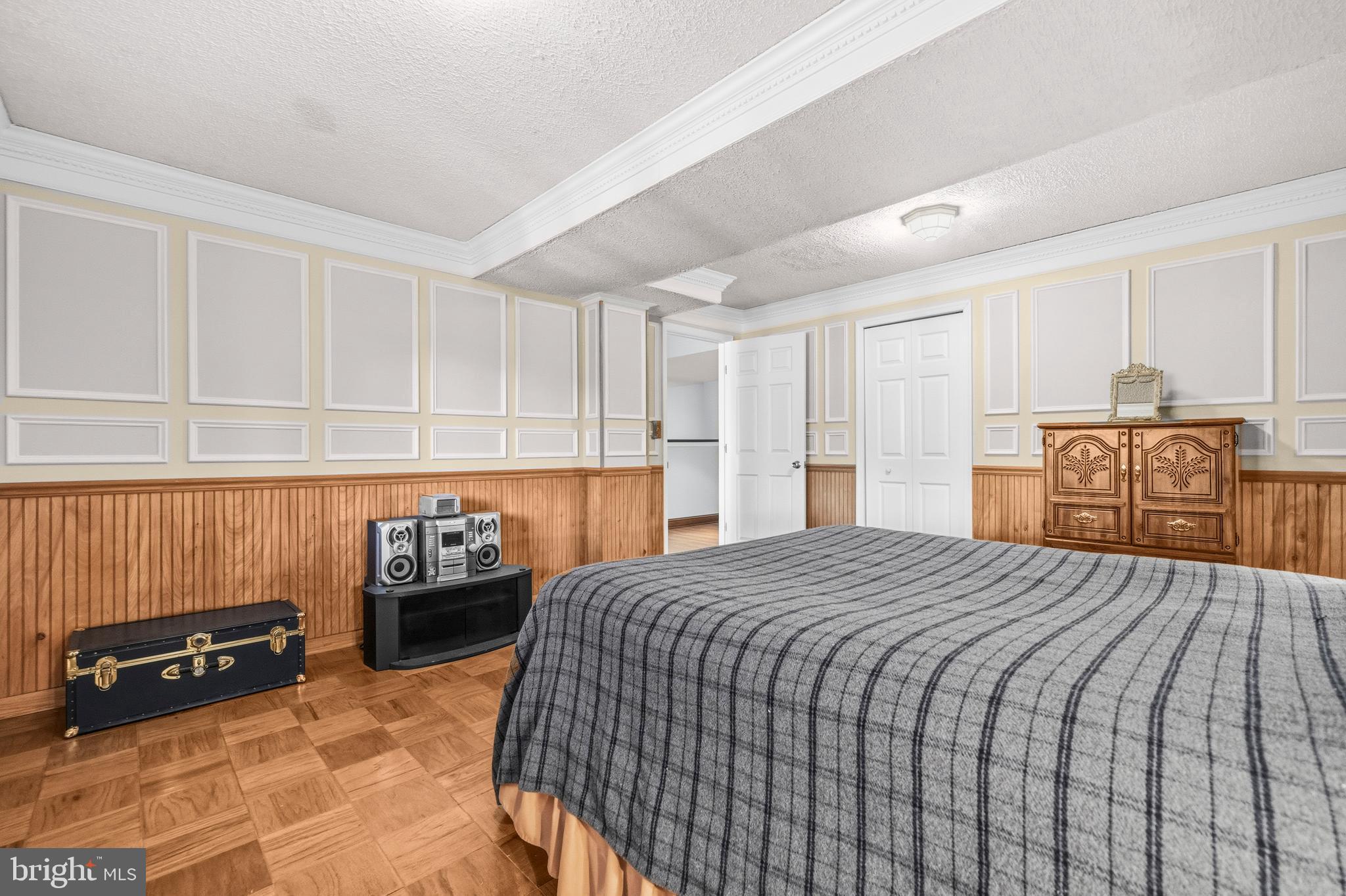 16170 Ed Warfield Road Woodbine, MD 21797 - Photo 57 of 80 a bed room with a bed and a couch