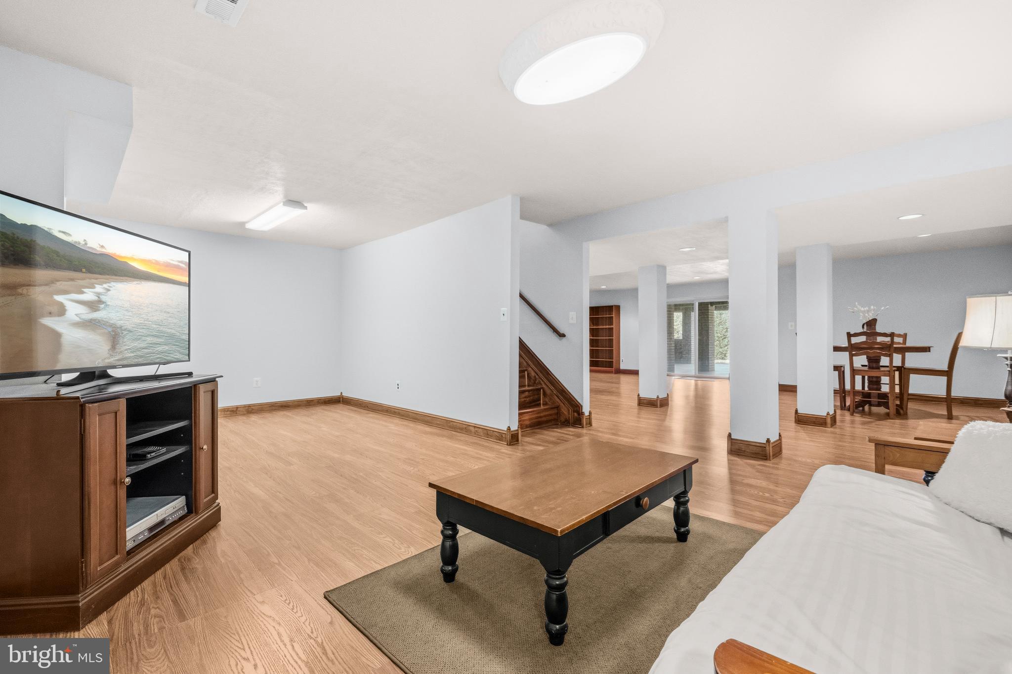 16170 Ed Warfield Road Woodbine, MD 21797 - Photo 58 of 80 a living room with furniture and a flat screen tv