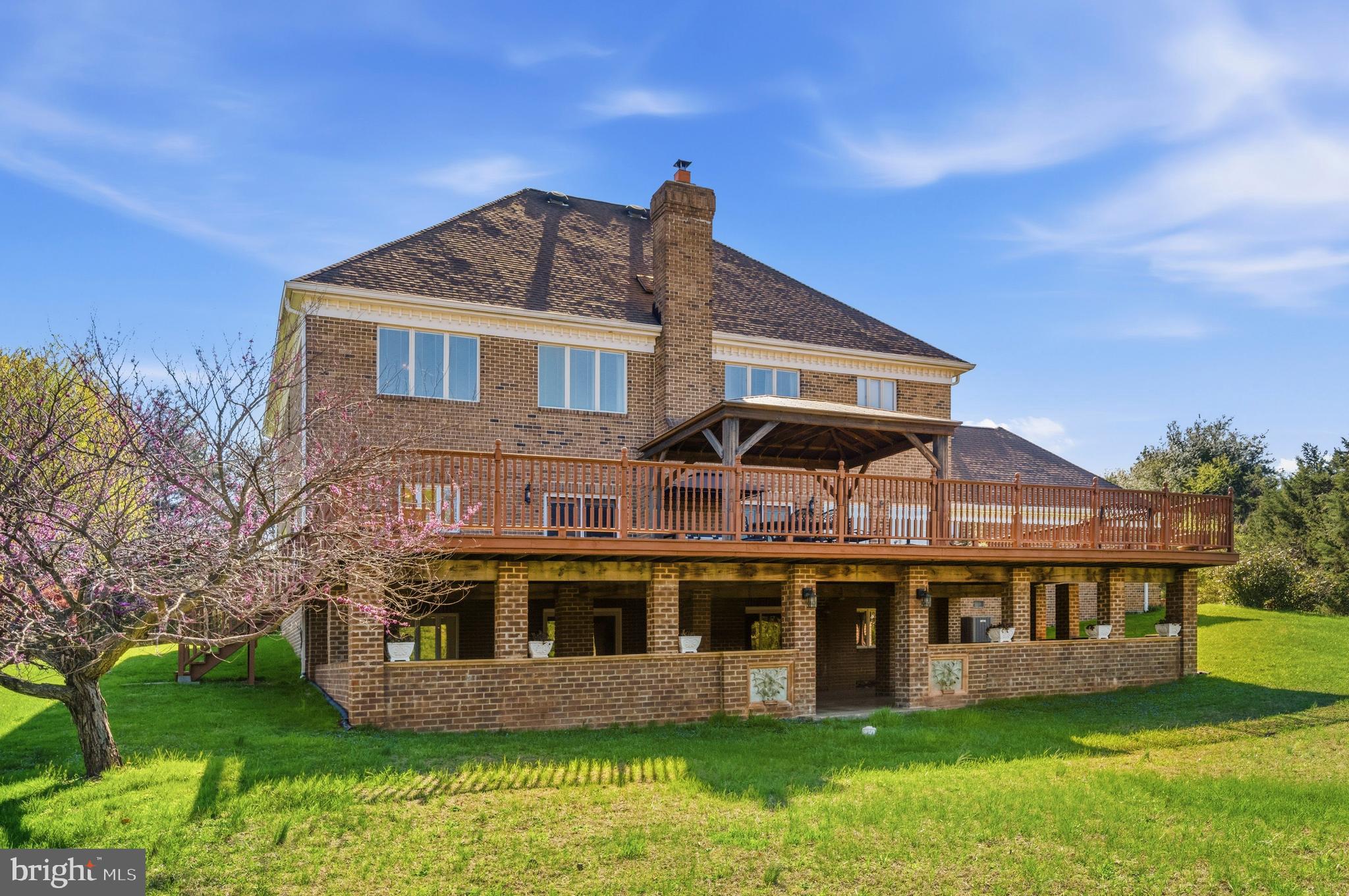 16170 Ed Warfield Road Woodbine, MD 21797 - Photo 68 of 80 a front view of a house with garden and swimming pool