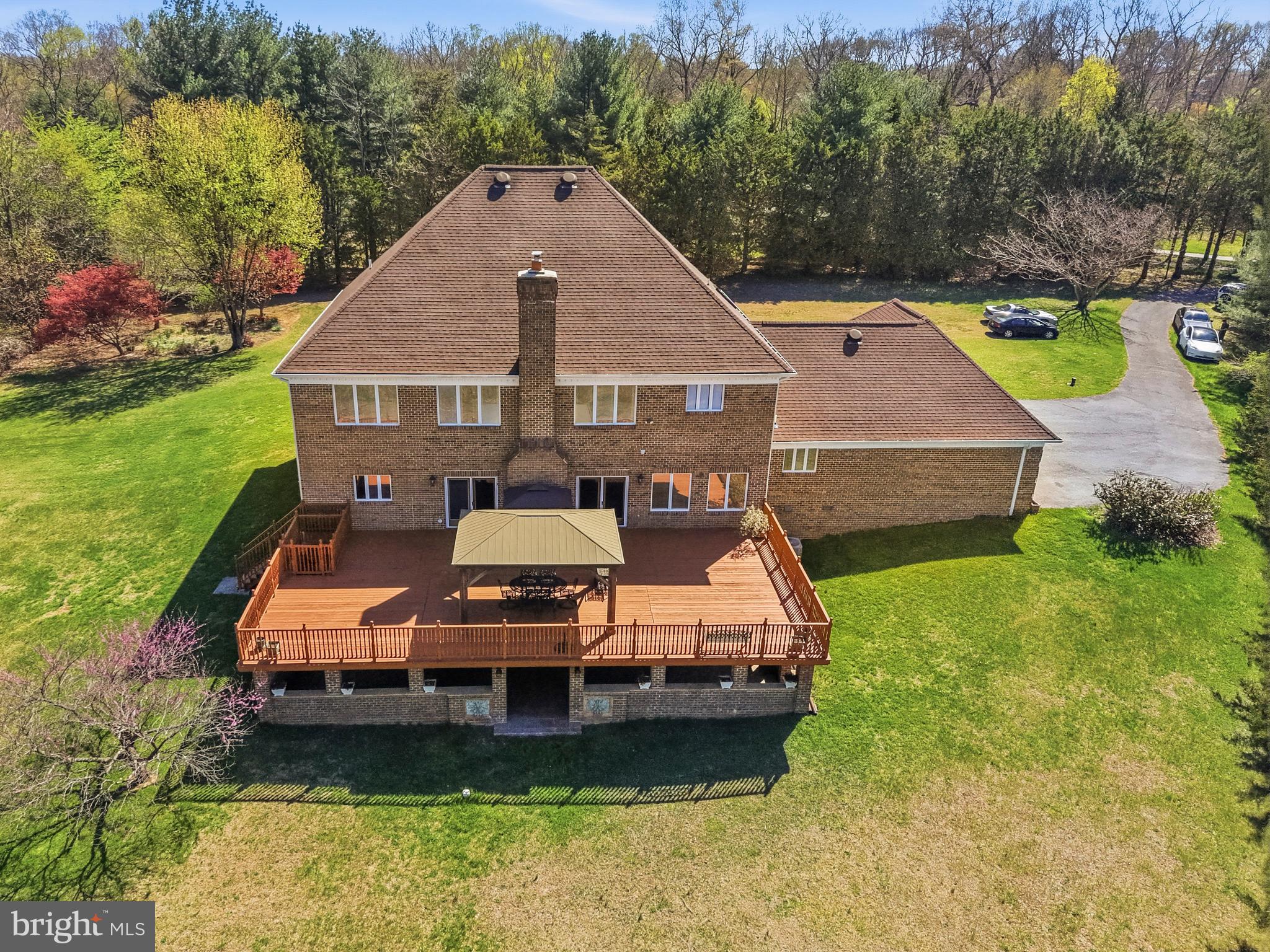 16170 Ed Warfield Road Woodbine, MD 21797 - Photo 70 of 80 a aerial view of a house with swimming pool and a yard