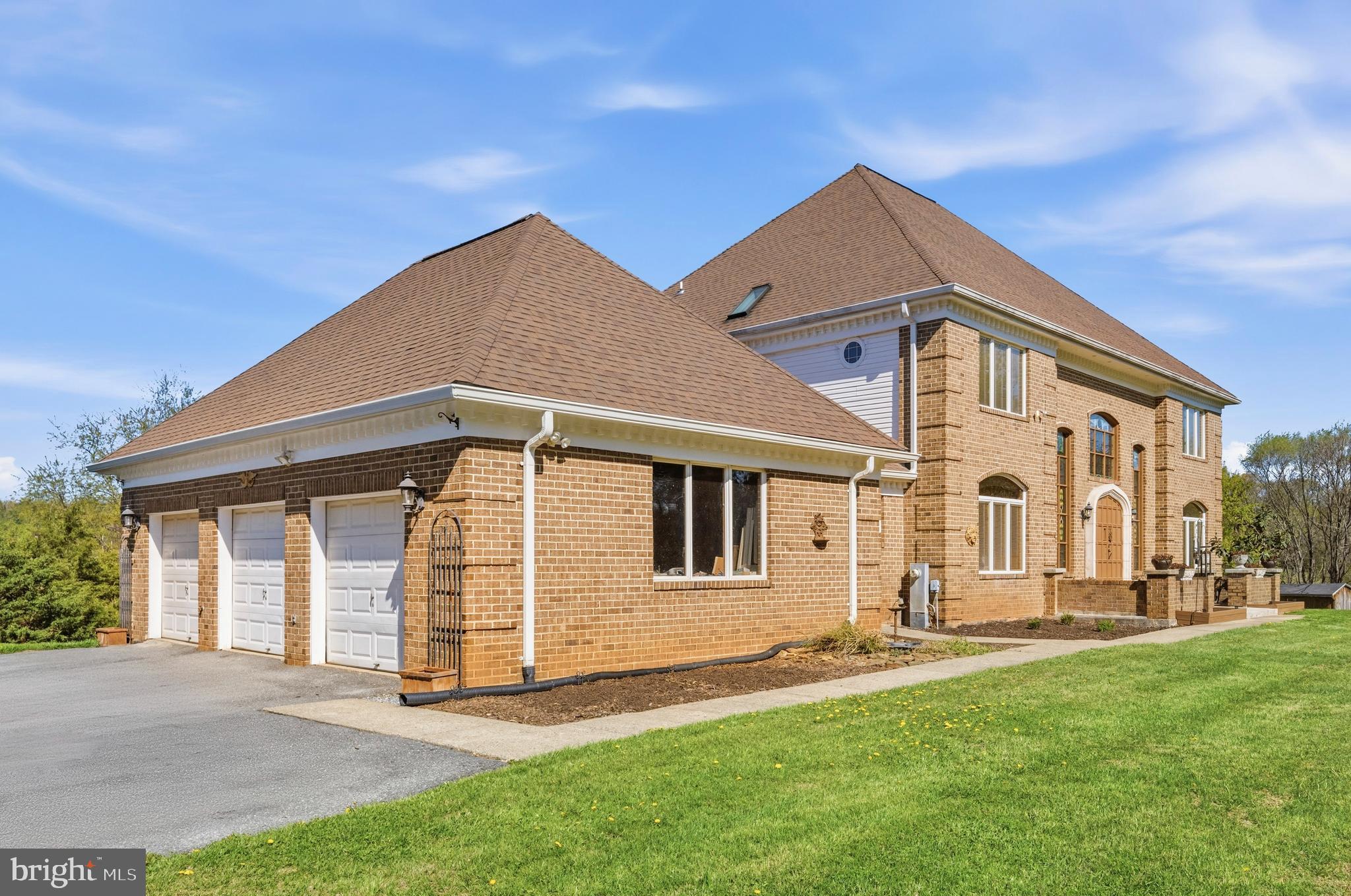 16170 Ed Warfield Road Woodbine, MD 21797 - Photo 8 of 80 a front view of a house with a yard