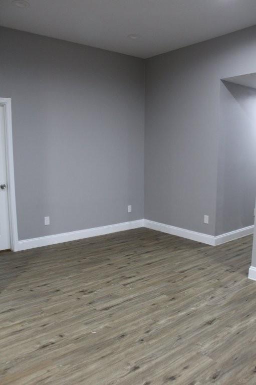 125 Chapperall Drive Mabank, TX 75156 - Photo 11 of 11 a view of a room with wooden floor
