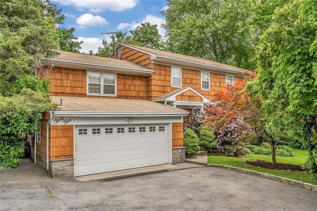 34 Mohegan Place New Rochelle, NY 10804 - Photo 1 of 1 Welcome to 34 Mohegan Place! long private driveway!