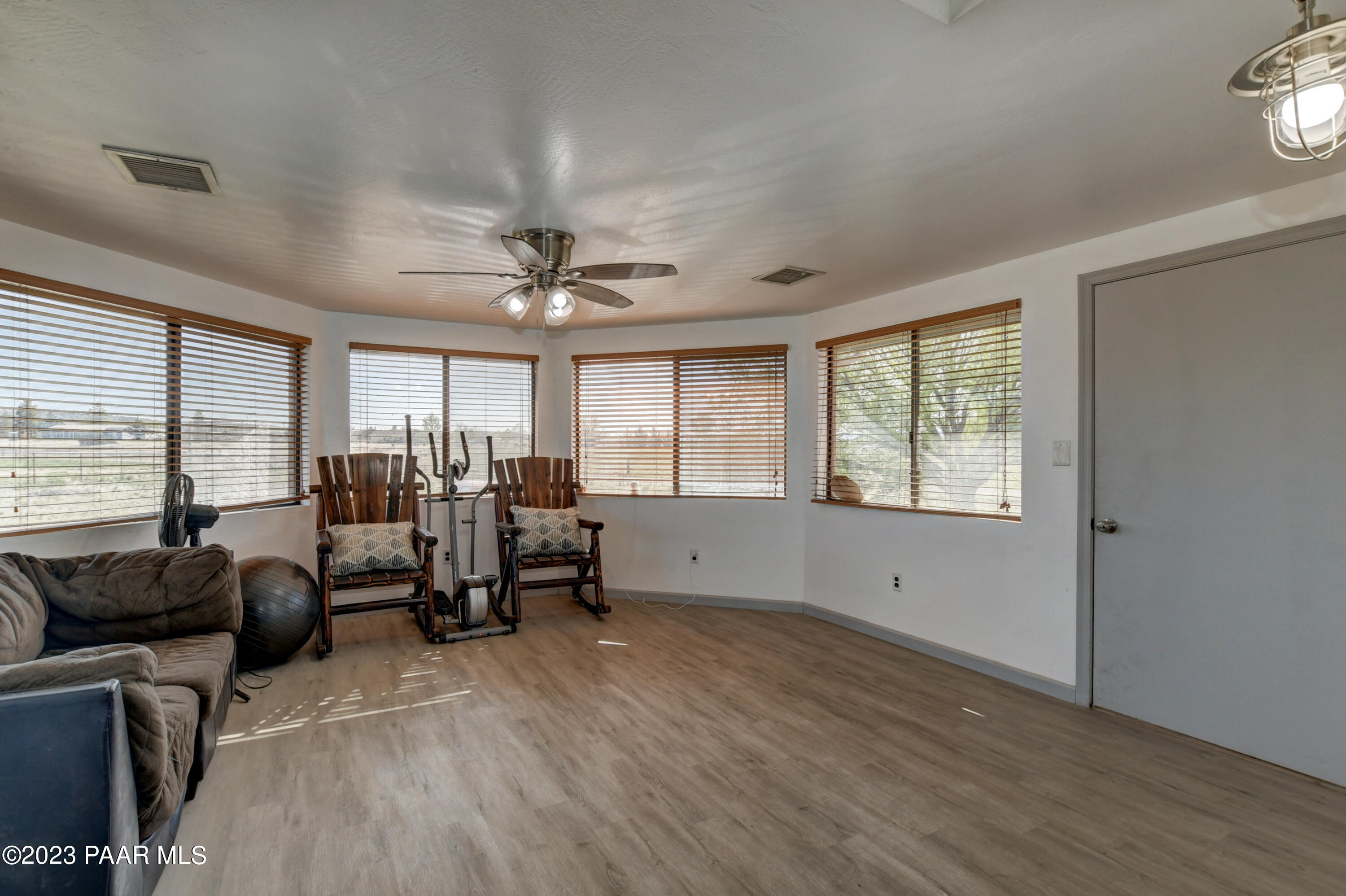 25750 North Reed Road Paulden, AZ 86334 - Photo 25 of 51 a living room with furniture and a large window