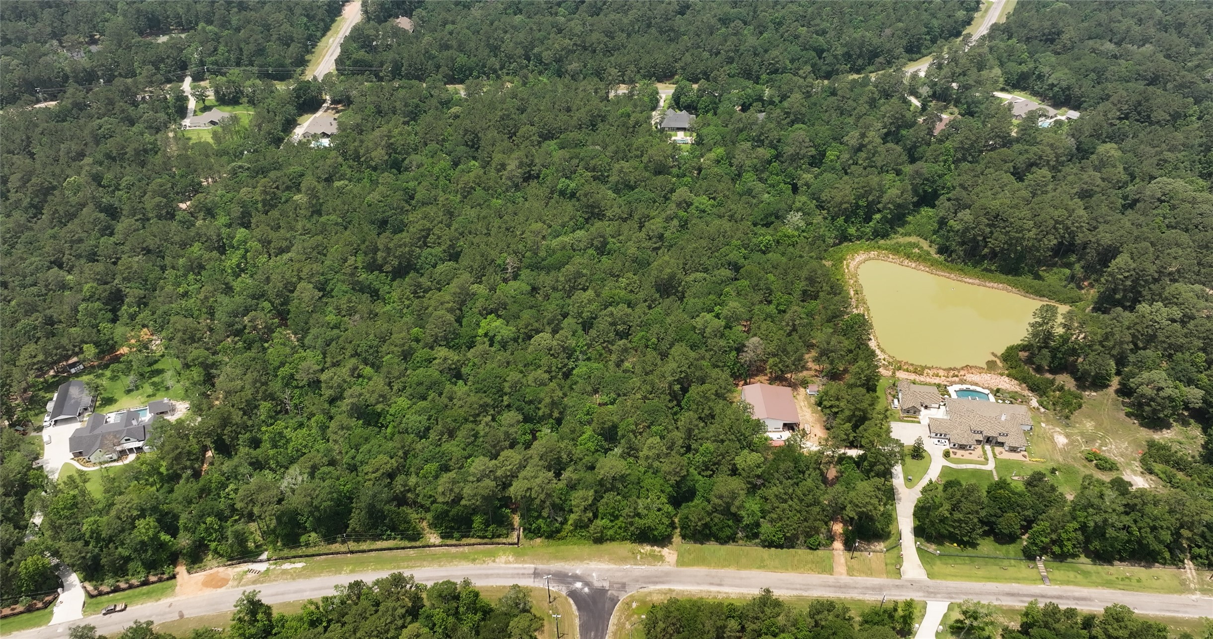 167 B Winchester Road Huntsville, TX 77340 - Photo 15 of 25 a view of a yard