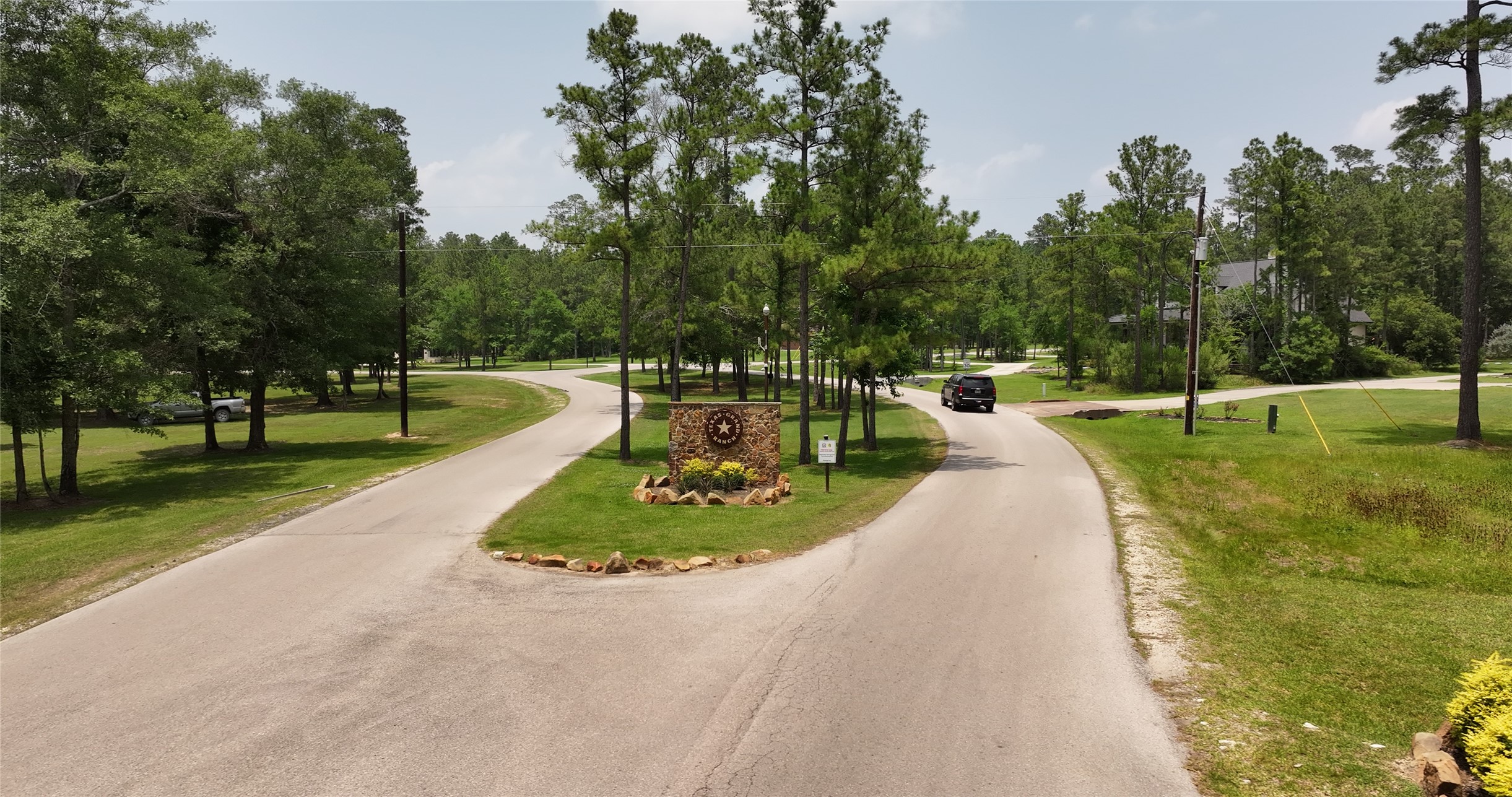 167 B Winchester Road Huntsville, TX 77340 - Photo 19 of 25 a view of a park with large trees