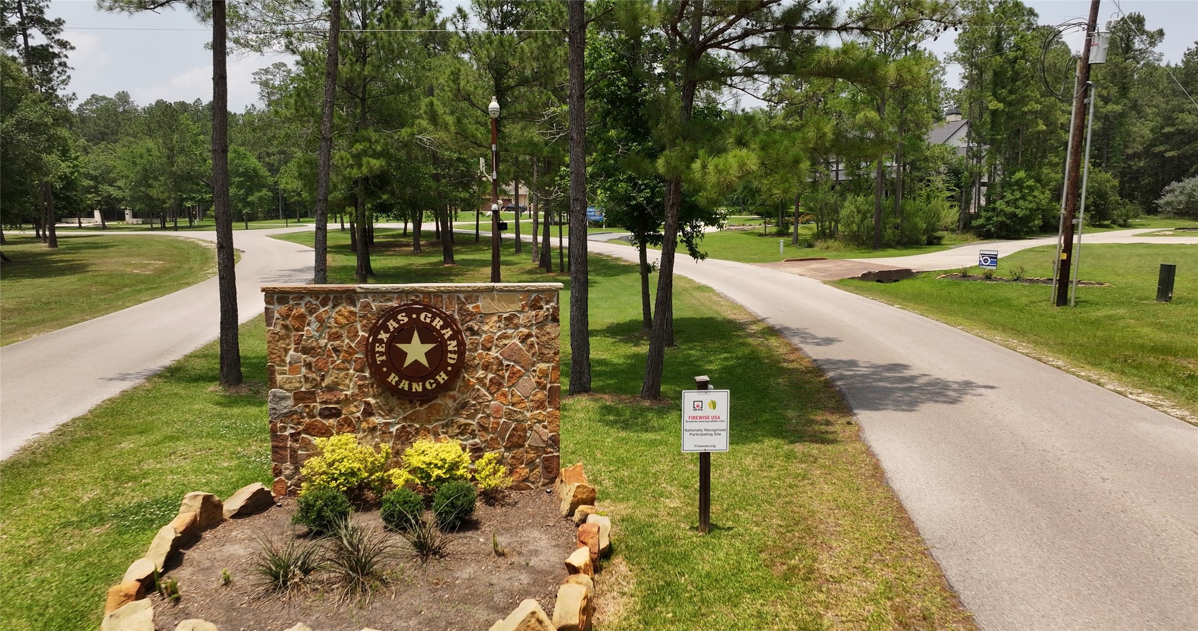 167 B Winchester Road Huntsville, TX 77340 - Photo 3 of 25 a view of a park with large trees