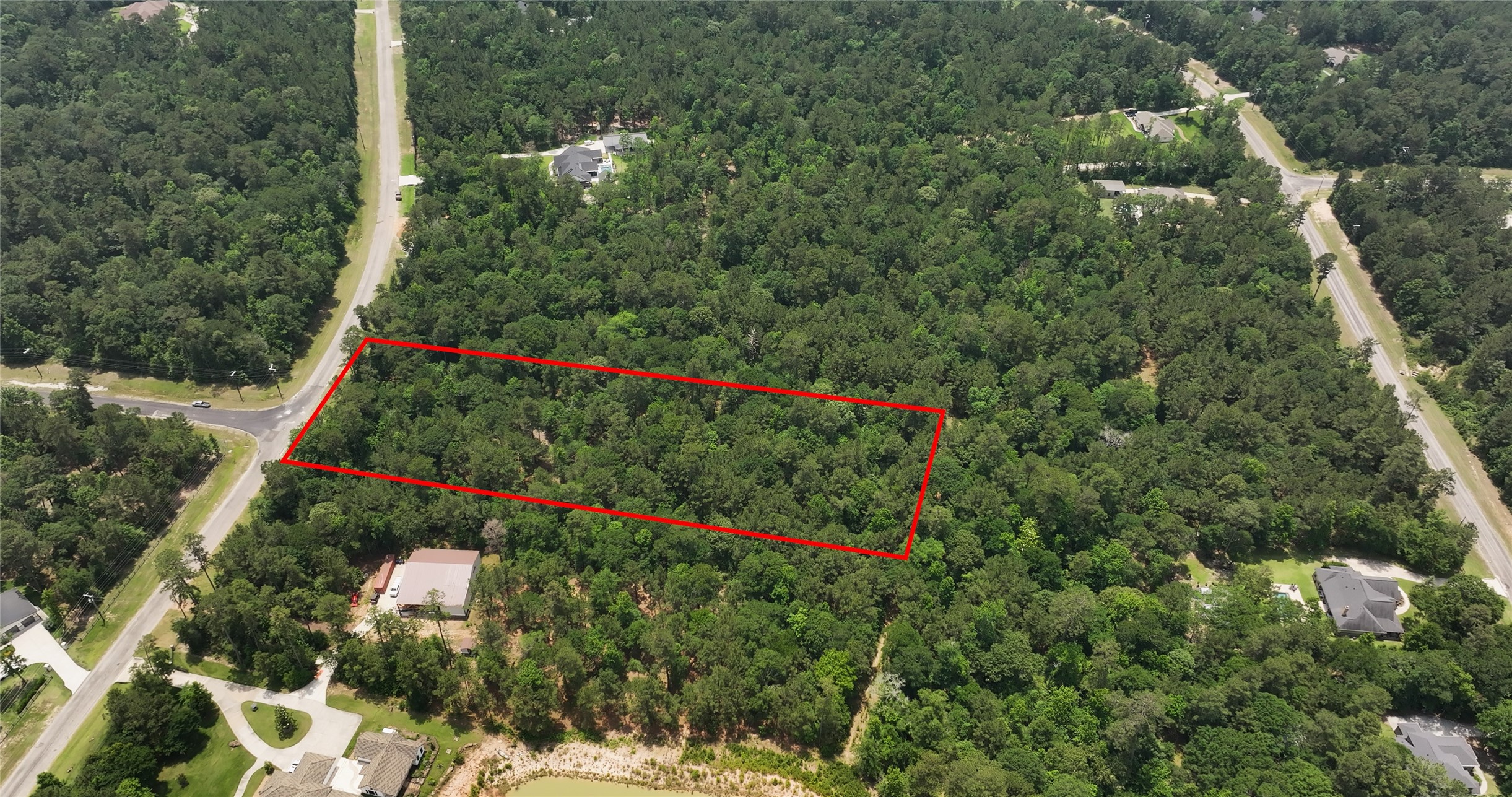 167 B Winchester Road Huntsville, TX 77340 - Photo 6 of 25 a view of a flower garden