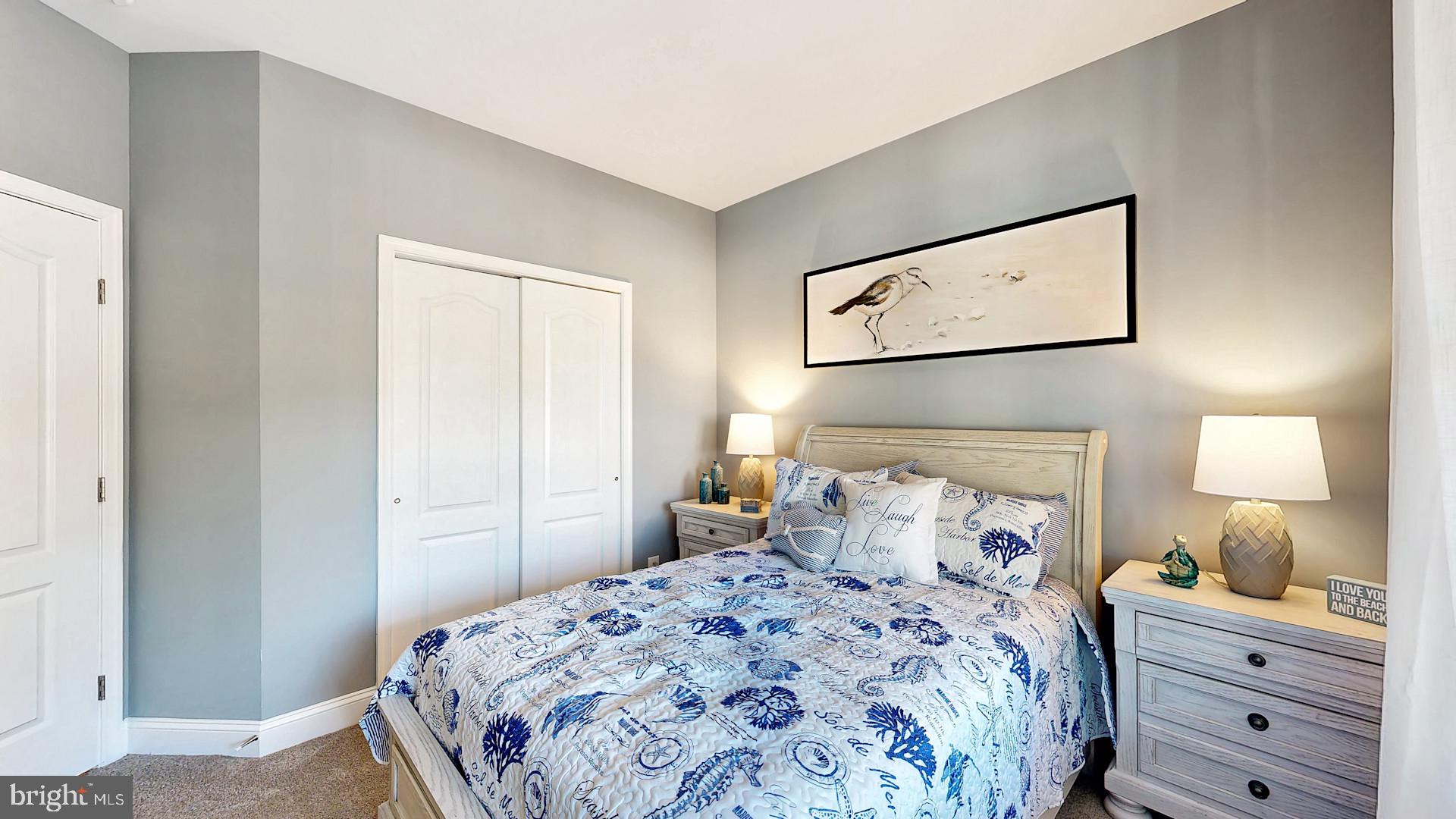 2 Waterview Road Lewes, DE 19958 - Photo 17 of 17 a bedroom with a bed and a night stand