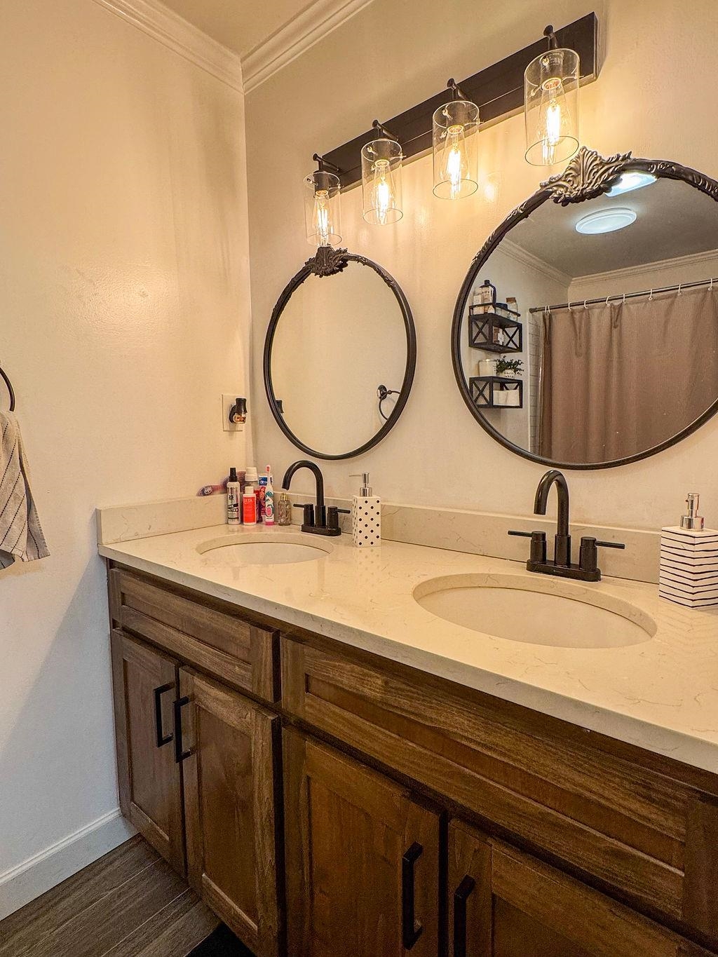 127 Walton Loop Covington, TN 38019 - Photo 28 of 40 a bathroom with a sink and a mirror
