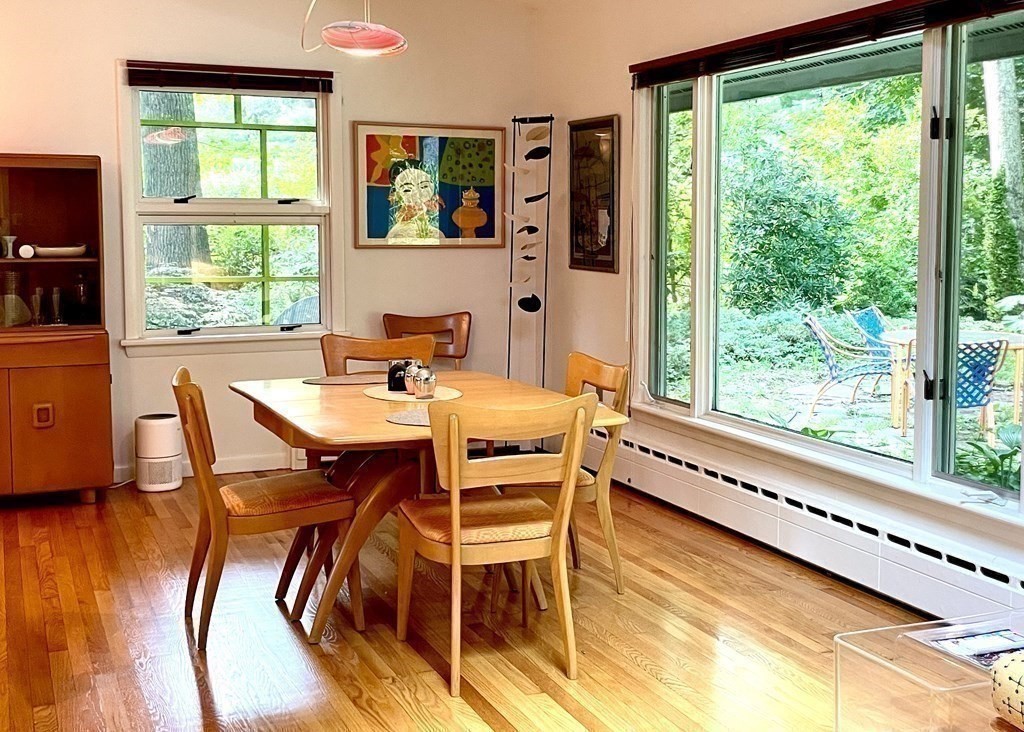 701 Westhampton Road Northampton, MA 01062 - Photo 8 of 22 a dining room with furniture and wooden floor