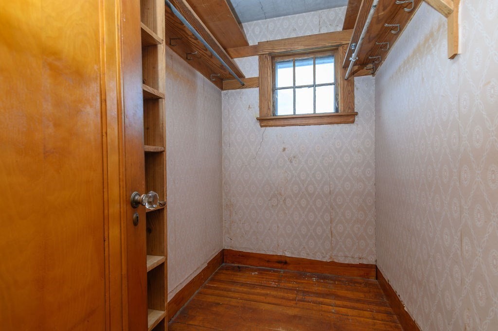 56 Putnam Street Weymouth, MA 02189 - Photo 18 of 39 a view of a room with wooden floor and a window