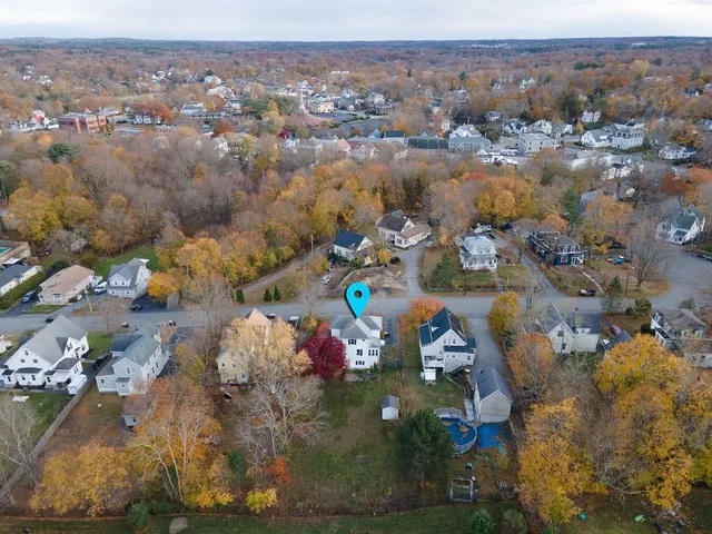 an aerial view of a city with lots of residential buildings