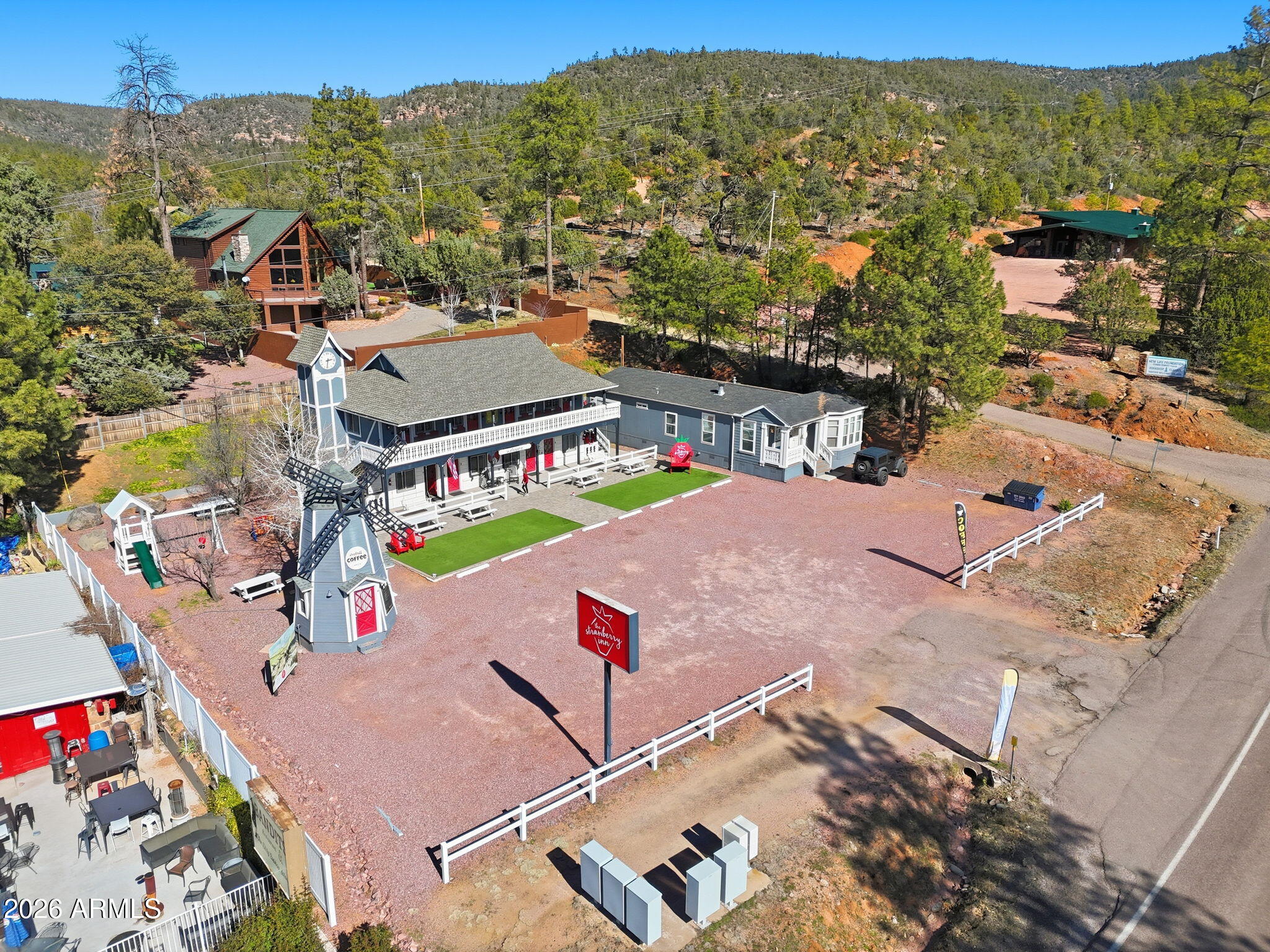 8247 Ralls Drive Pine, AZ 85544 - Photo 42 of 50 an aerial view of residential houses with outdoor space