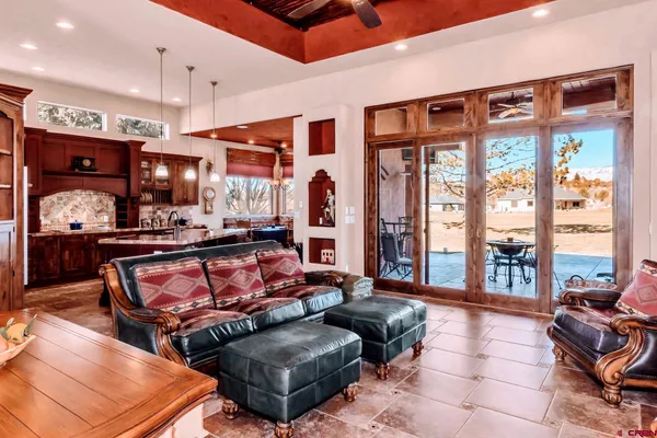 a room with lots of table and chairs