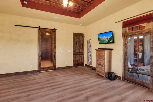 a bathroom with a shower and a window
