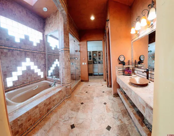 a view of a livingroom with furniture and hardwood floor