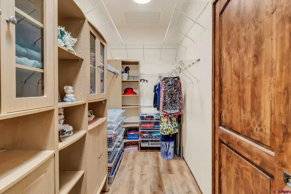 a bathroom with a sink mirror vanity and toilet