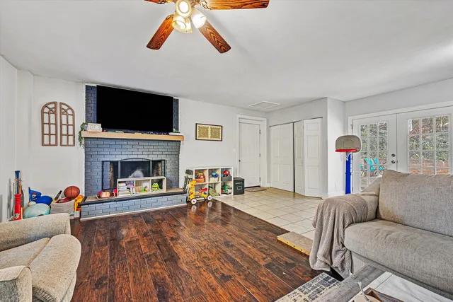 a bathroom with a sink mirror and toilet