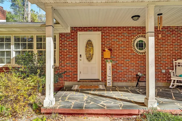 a view of a yard with an outdoor space