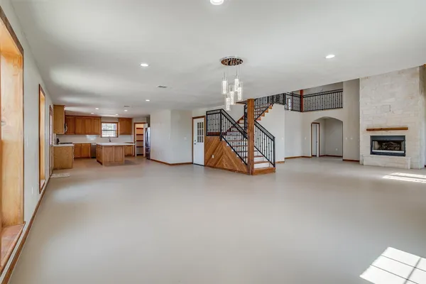 a kitchen with a stove a sink and a refrigerator