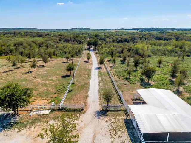 a view of a lake with a yard