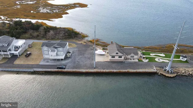 a view of a lake with a car parked