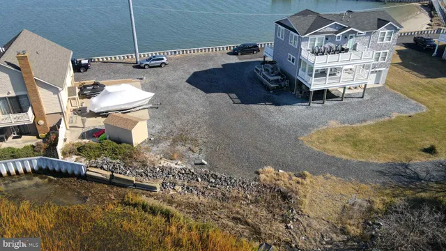 an aerial view of a house with swimming pool