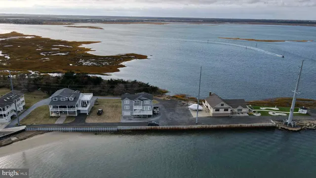 a view of a house with a ocean view