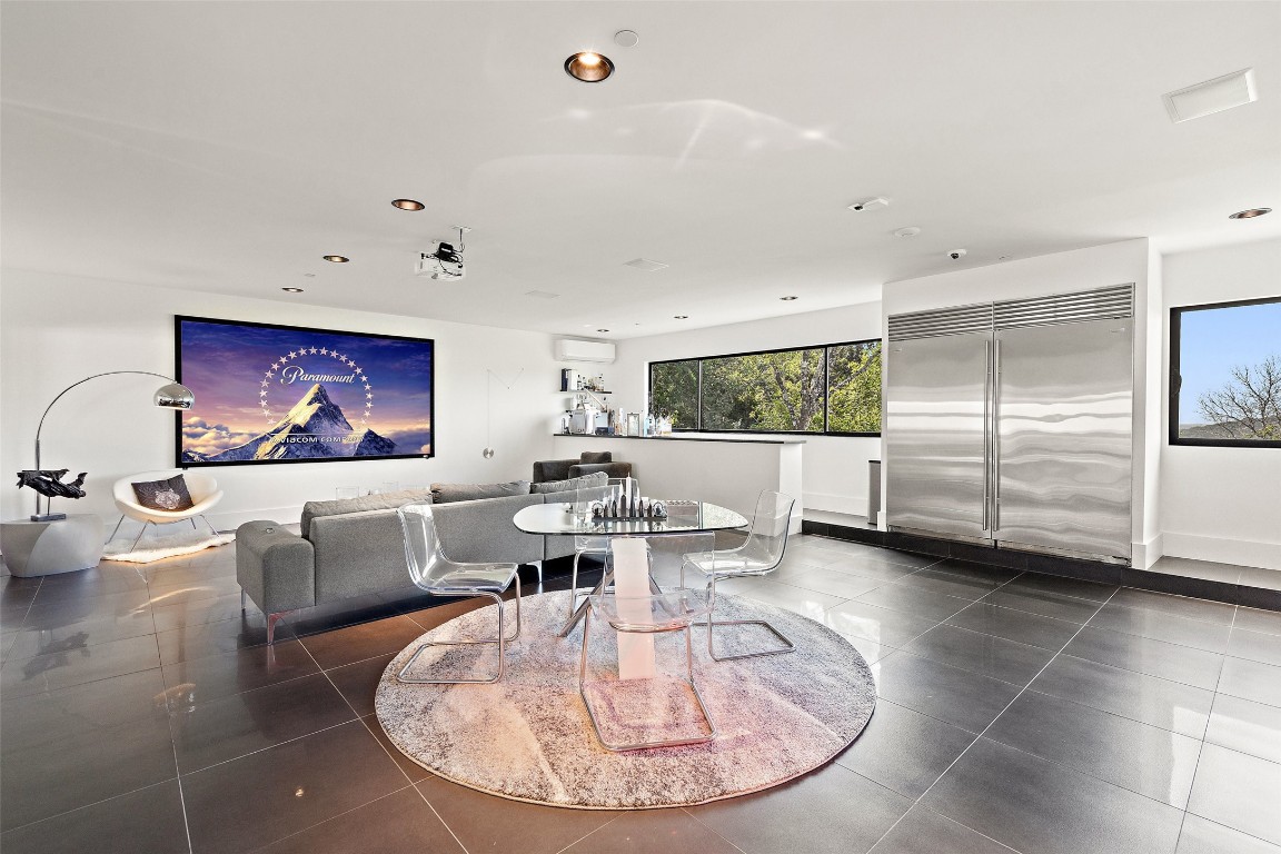 1501 Ridgecrest Drive Austin, TX 78746 - Photo 35 of 40 a view of a living room and dining room