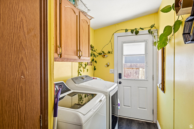4296 Maple Lane Cedar City, UT 84721 - Photo 14 of 44 Dedicated laundry area featuring wood-finish cabinetry, a paneled exterior door with an inset window, and dark flooring