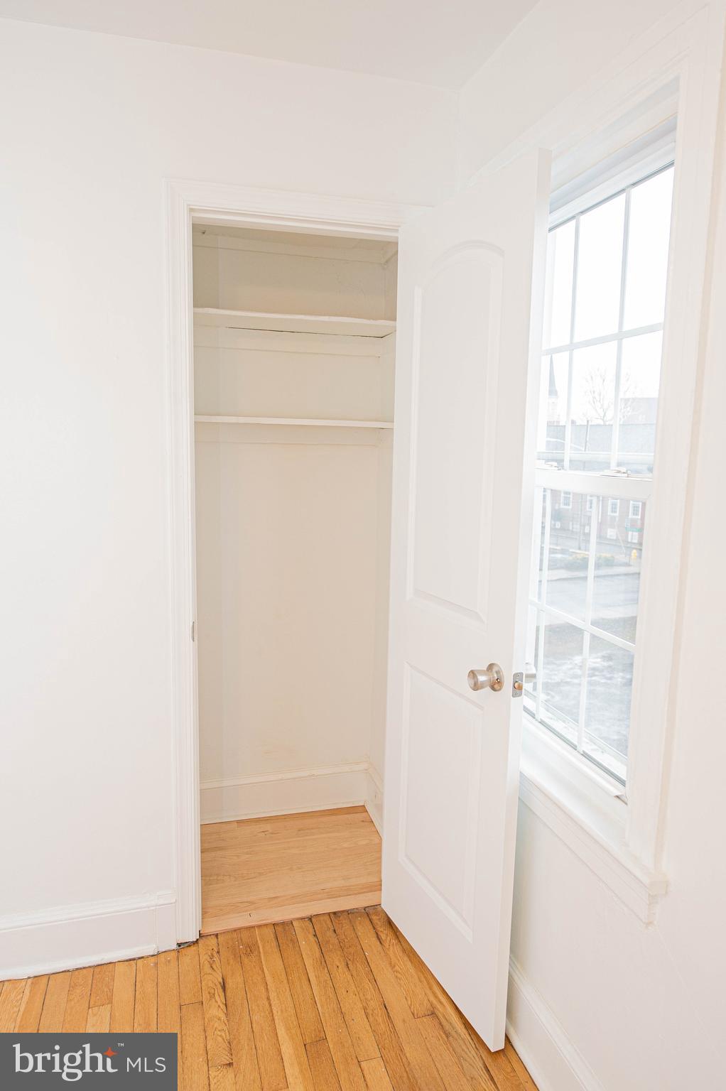 308 North Division Street, Unit 16 Salisbury, MD 21801 - Photo 47 of 61 a view of walk in closet with empty racks