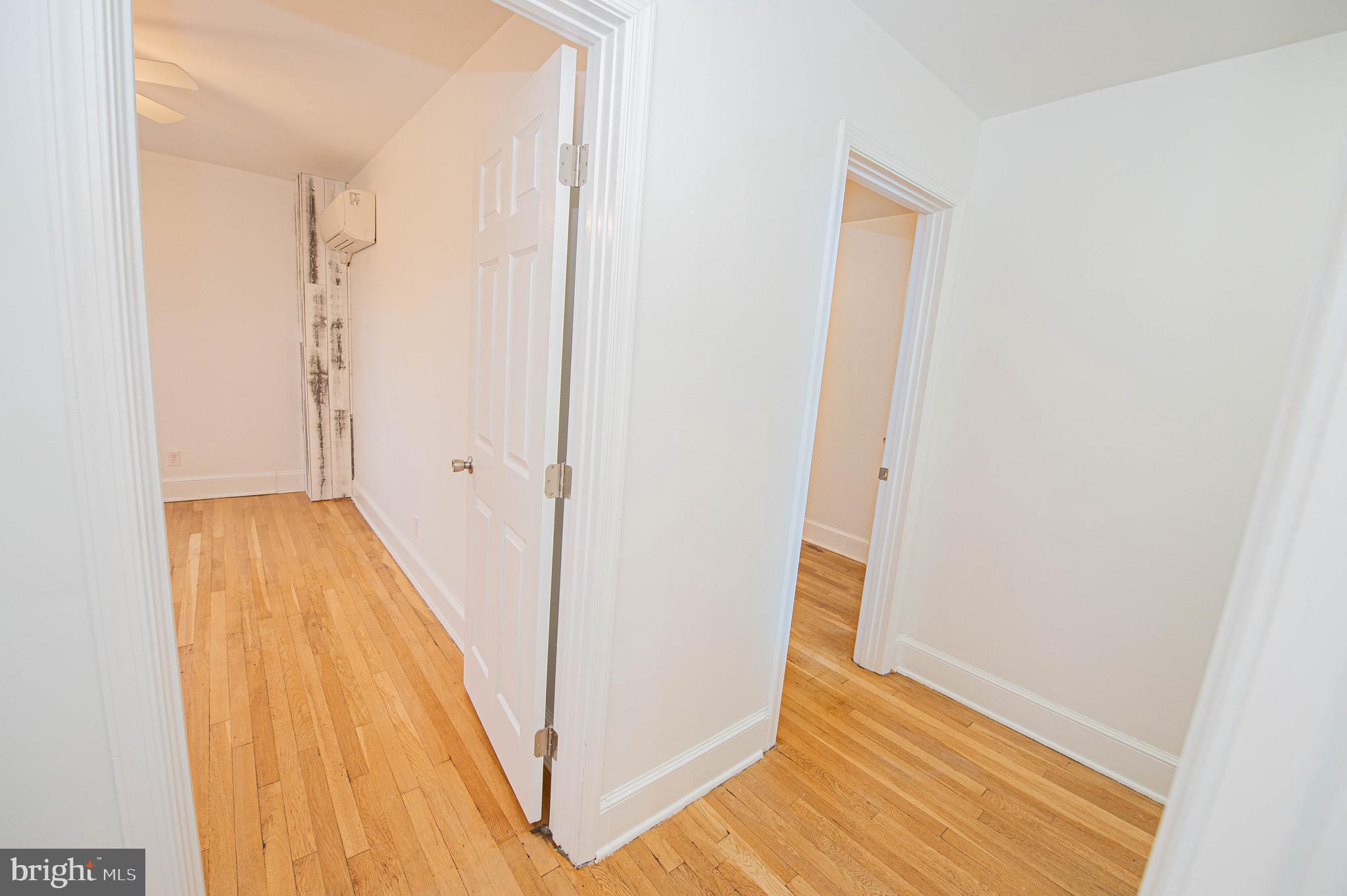 308 North Division Street, Unit 16 Salisbury, MD 21801 - Photo 58 of 61 a view of room with wooden floor