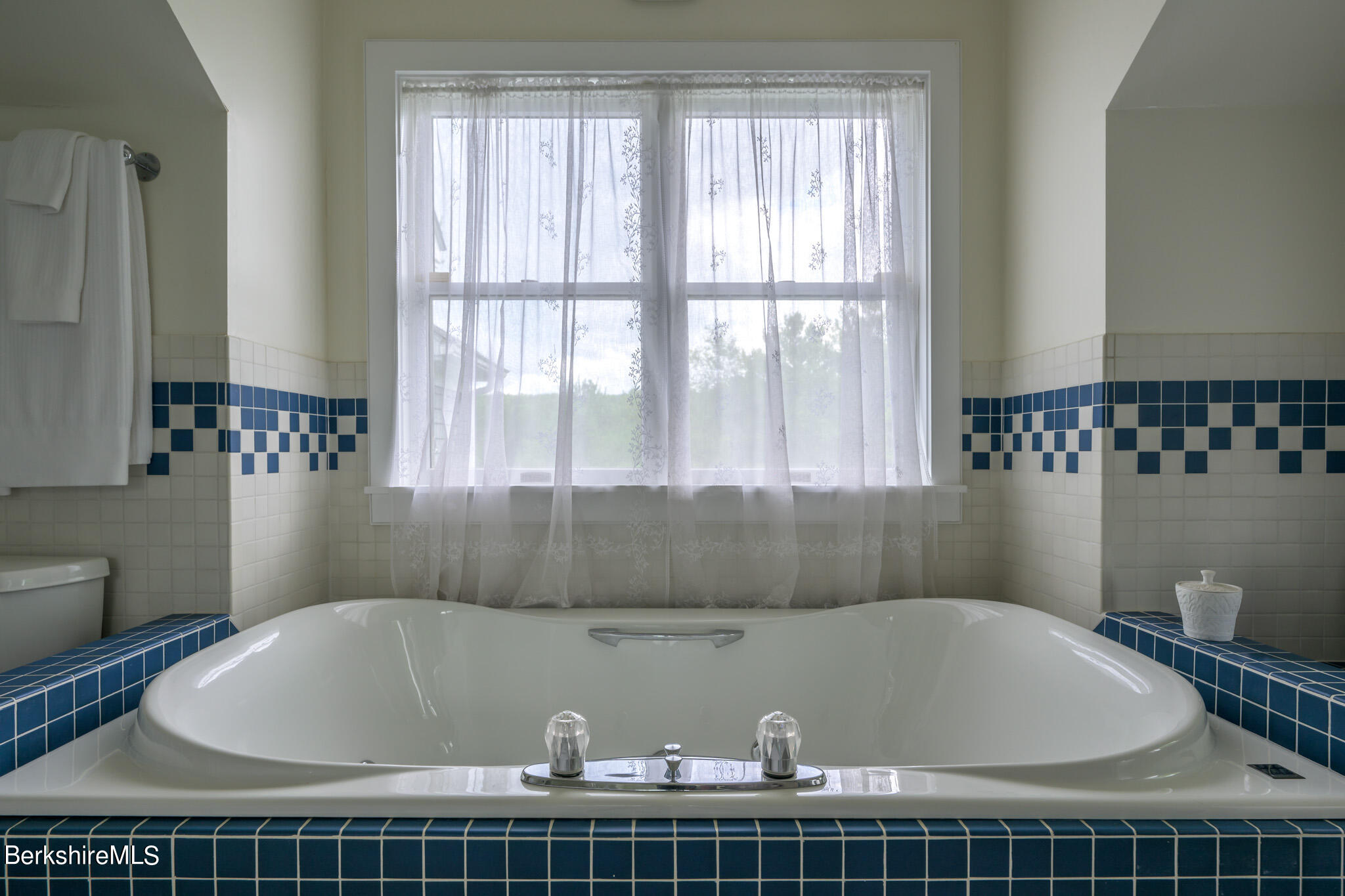 176 West Center Road West Stockbridge, MA 01266 - Photo 26 of 57 a bath tub sitting in a bathroom next to a window