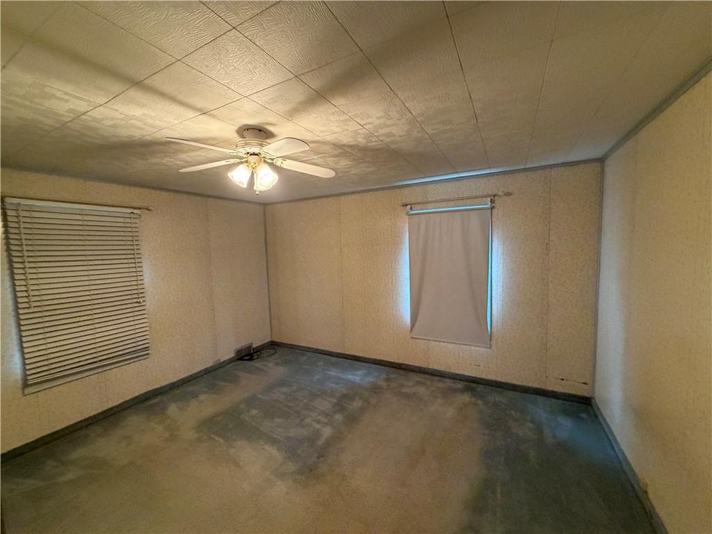 1041 4th Street Monongahela, PA 15063 - Photo 21 of 28 an empty room with windows and fan