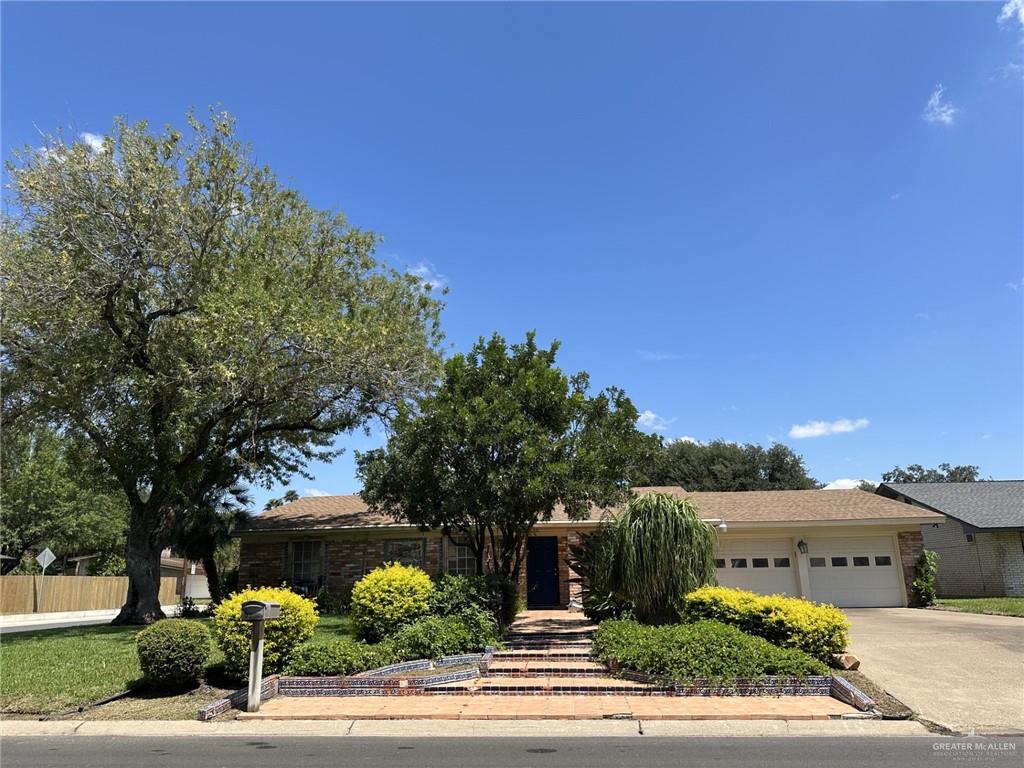 a view of a street with a building in the background