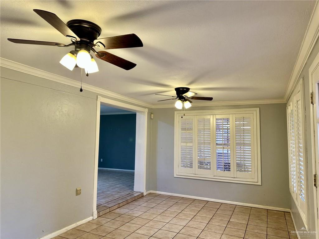 1518 Redbud Avenue McAllen, TX 78504 - Photo 11 of 39 a view of an empty room with a window