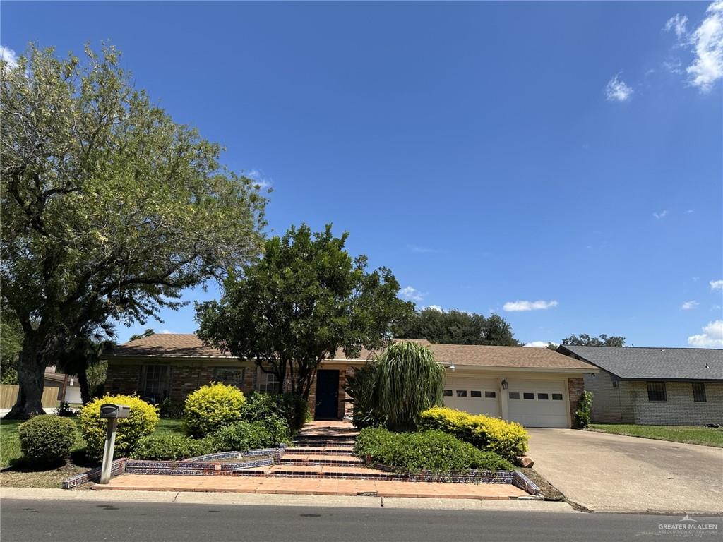 1518 Redbud Avenue McAllen, TX 78504 - Photo 2 of 39 a view of a street with houses