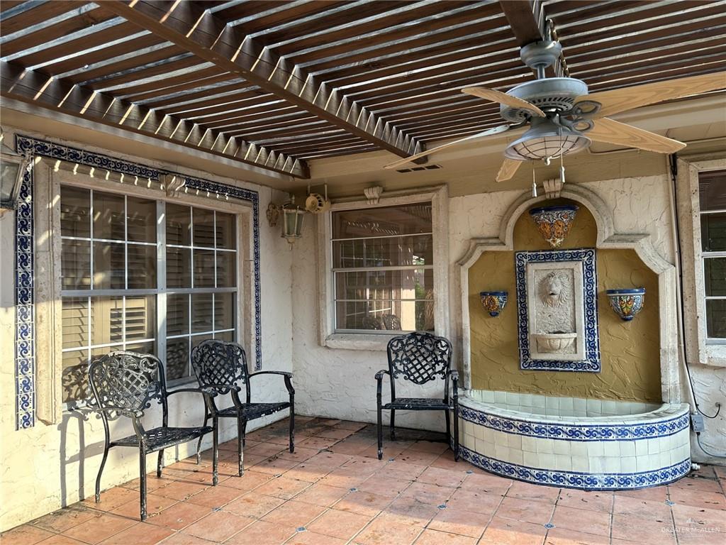 1518 Redbud Avenue McAllen, TX 78504 - Photo 28 of 39 a front view of a house with outdoor seating