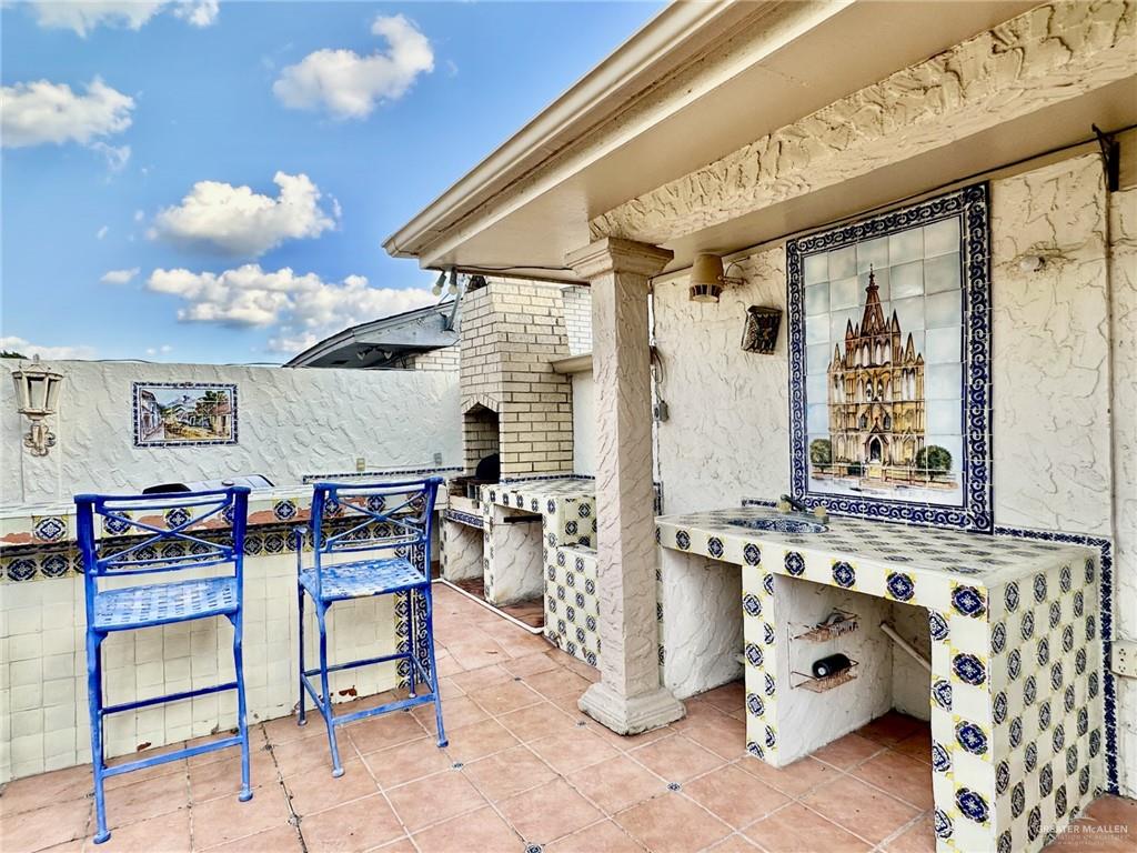 1518 Redbud Avenue McAllen, TX 78504 - Photo 34 of 39 a dinning table and chairs in a room