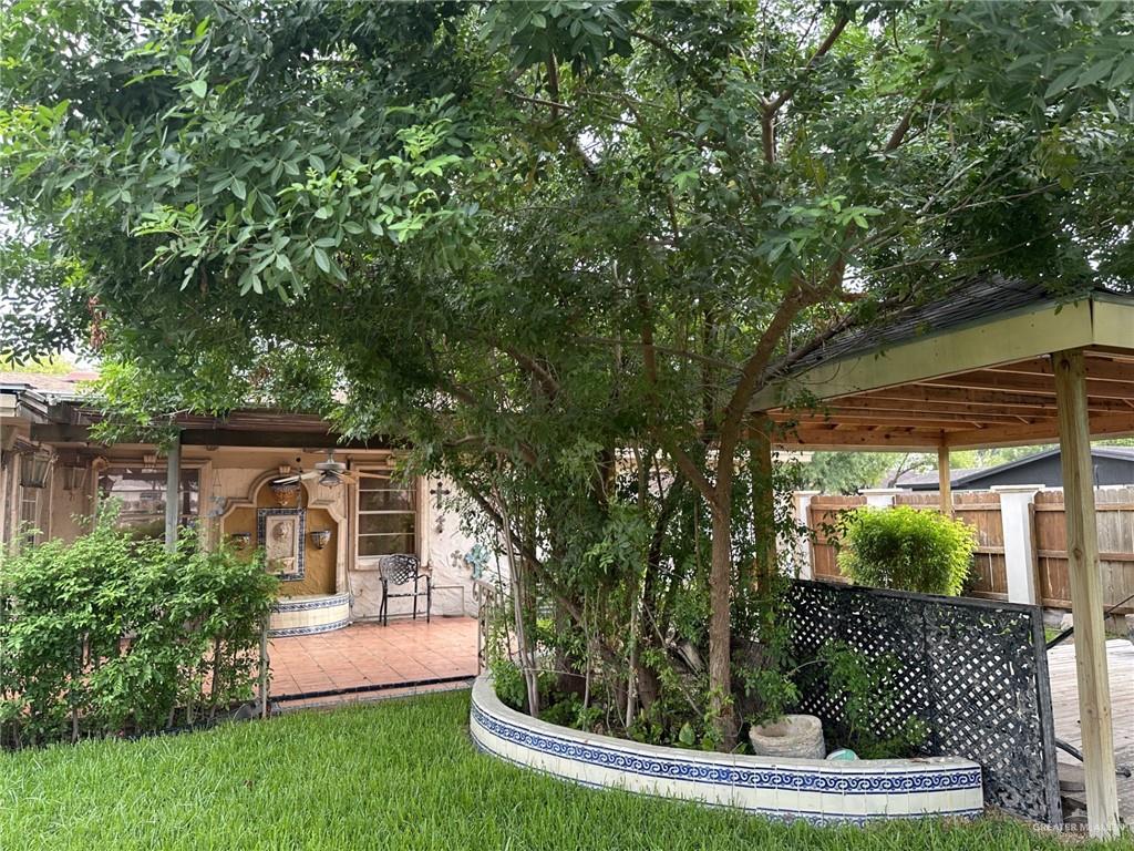 1518 Redbud Avenue McAllen, TX 78504 - Photo 37 of 39 a front view of a house with a yard
