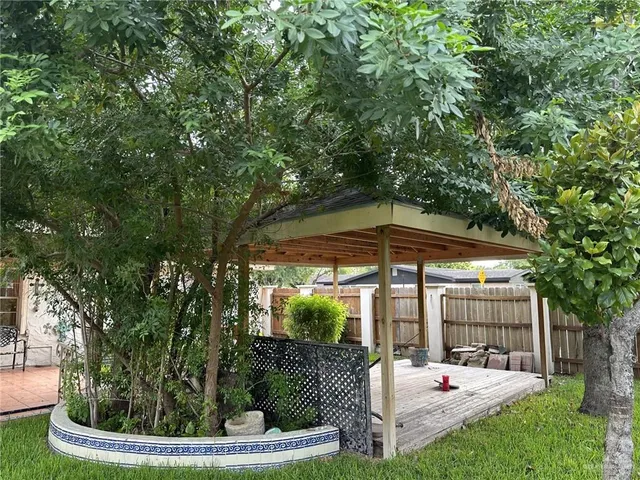 a view of backyard with seating space