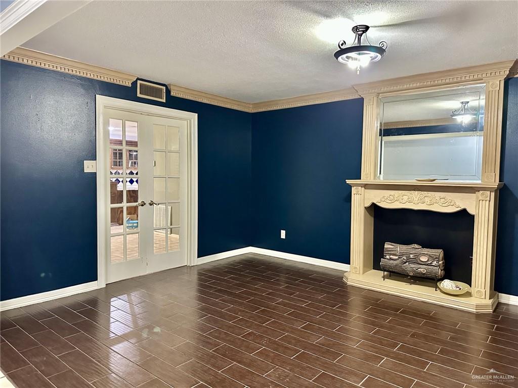 1518 Redbud Avenue McAllen, TX 78504 - Photo 8 of 39 a view of a livingroom with a fireplace
