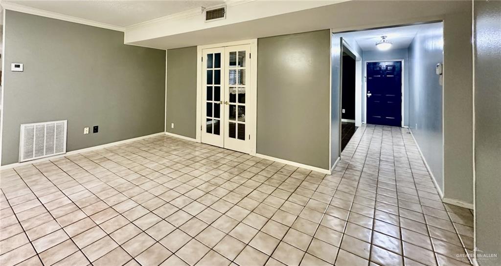 1518 Redbud Avenue McAllen, TX 78504 - Photo 9 of 39 a bedroom with a bed and closet