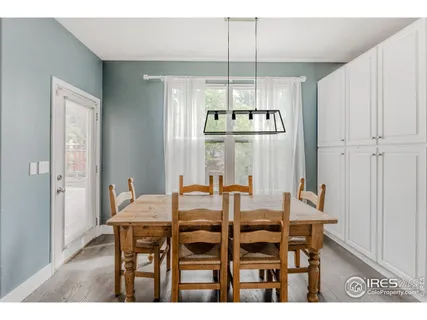 a view of kitchen with microwave and cabinets