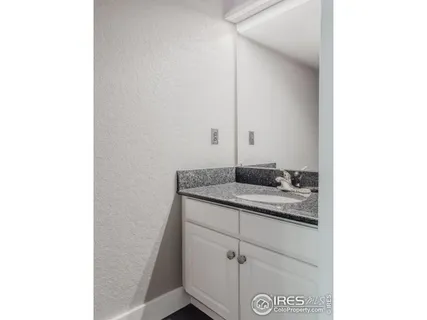 a view of a hallway with staircase